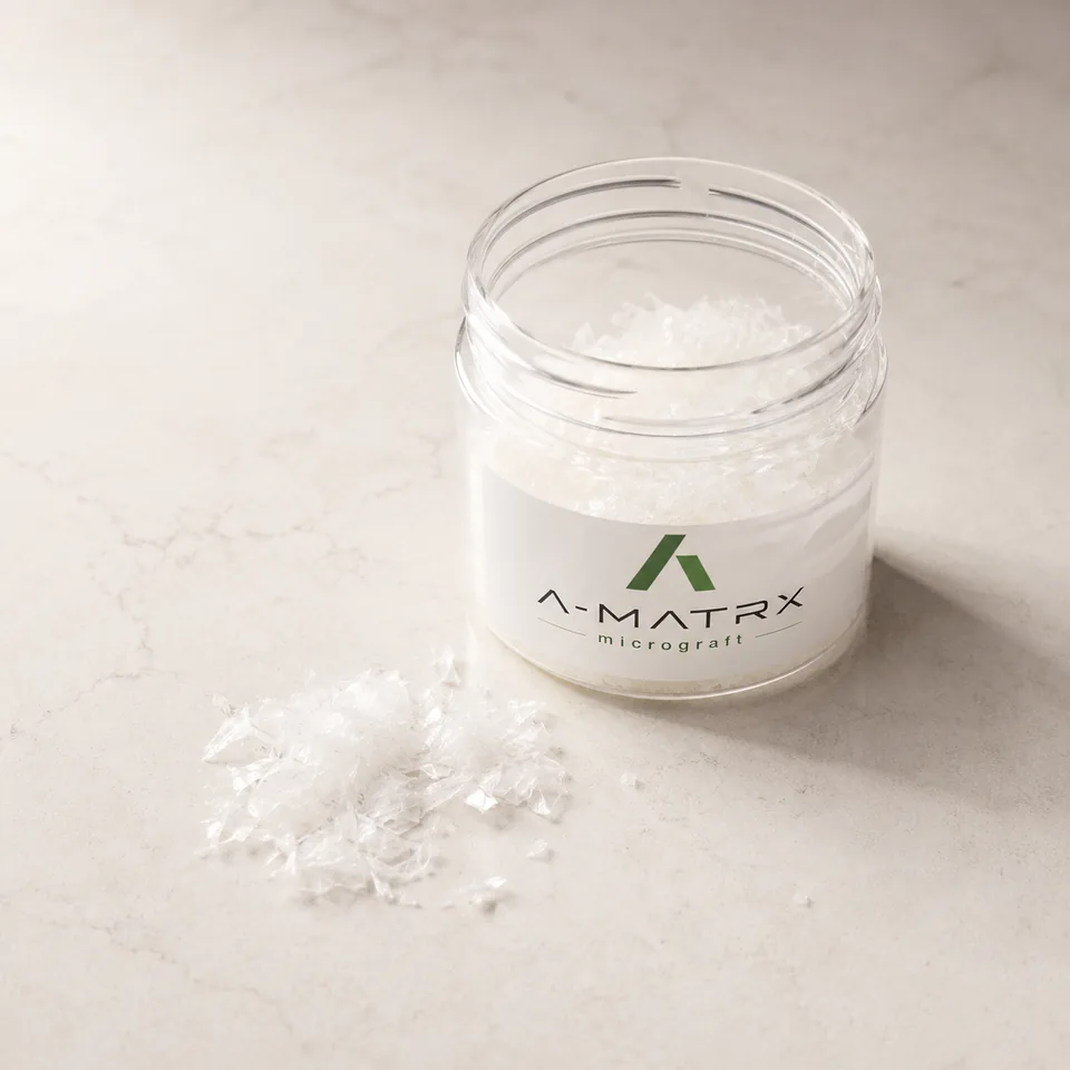 A-MATRX jar and flakes on surface